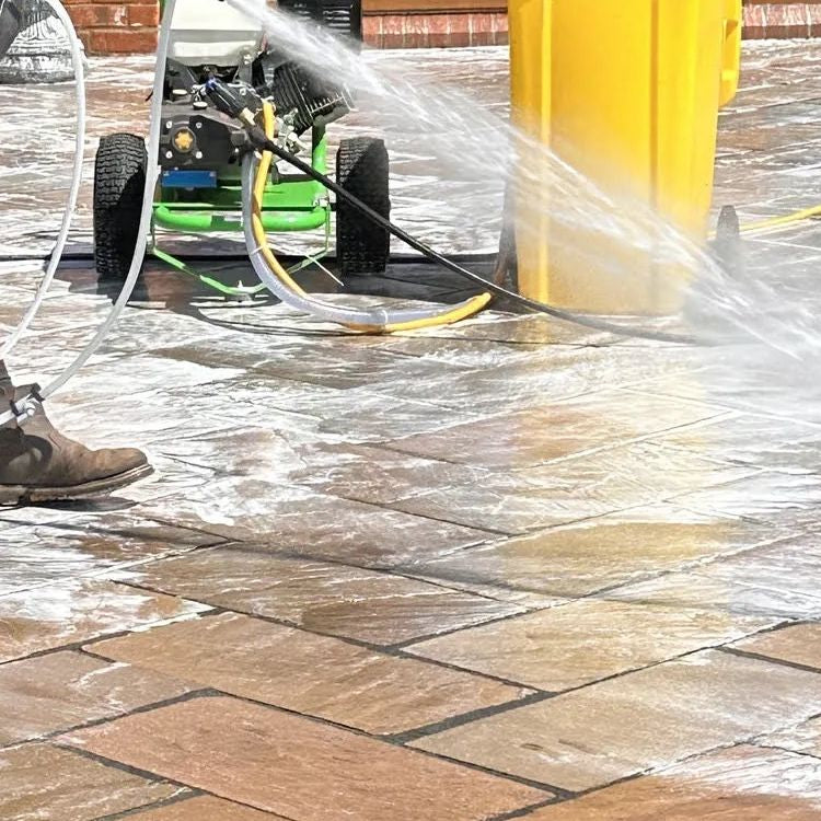 Professional pressure washing equipment for driveways and exterior surfaces
