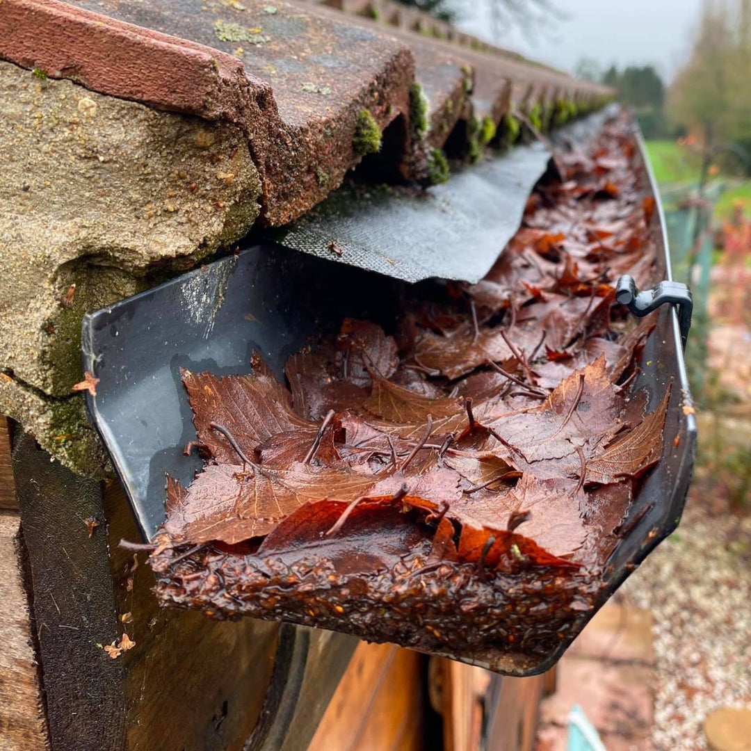 Pole system used for gutter clearing from the ground